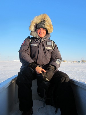 Peter Kikkert in arctic wearing winter clothing.
